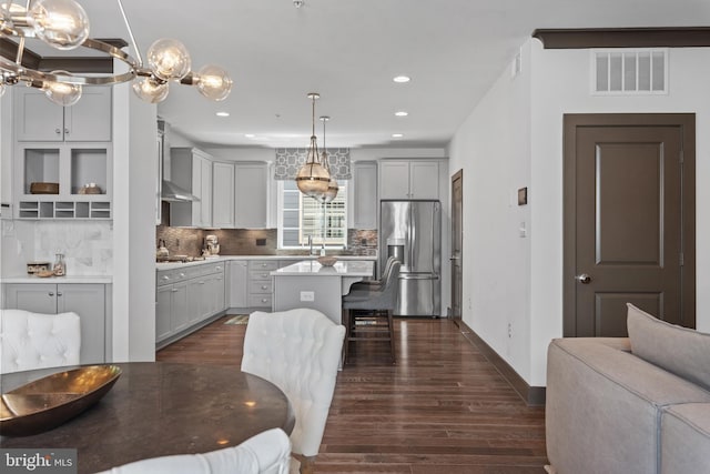 52 Primrose Hill Ln, Annapolis, MD 21403 - kitchen with appliances with stainless steel finishes, dark wood finished floors, a sink, backsplash, and recessed lighting