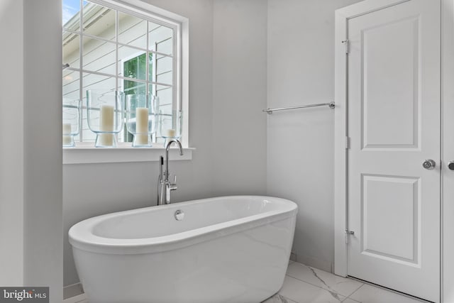 52 Primrose Hill Ln, Annapolis, MD 21403 - full bathroom featuring marble finish flooring, baseboards, and a soaking tub