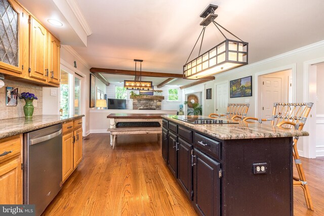 4690 Derby Ln, Doylestown, PA 18902 - kitchen featuring stainless steel dishwasher, a kitchen breakfast bar, ornamental molding, wood finished floors, and black electric cooktop