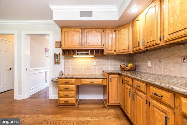4690 Derby Ln, Doylestown, PA 18902 - kitchen with ornamental molding, light stone counters, light wood-type flooring, tasteful backsplash, and open shelves