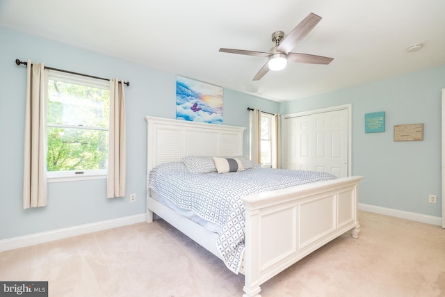 4690 Derby Ln, Doylestown, PA 18902 - bedroom with light carpet, a closet, and ceiling fan