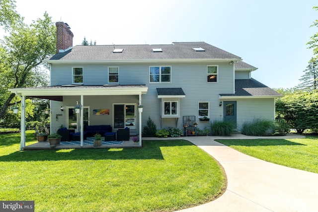 4690 Derby Ln, Doylestown, PA 18902 - back of property featuring a lawn and a patio area
