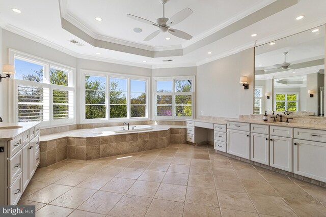 full bathroom featuring a ceiling fan, tile patterned floors, ornamental molding, and a bath