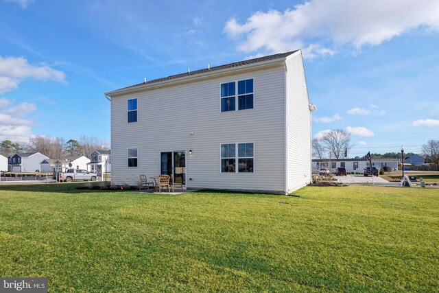32003 Downhaul Path, Selbyville, DE 19975 - back of property with a yard and a patio