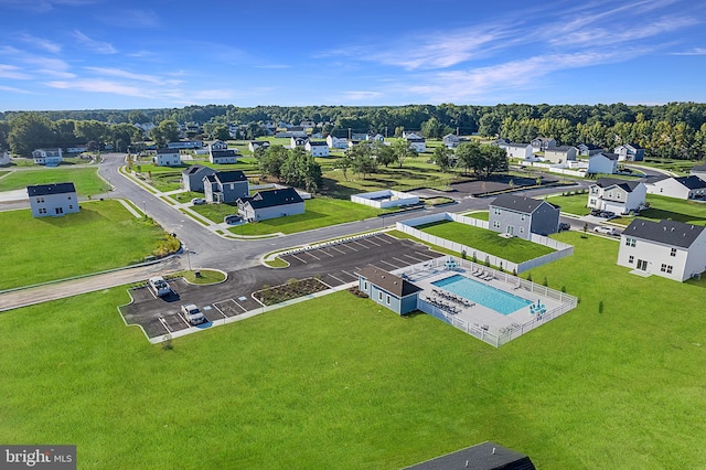 birds eye view of property with a residential view
