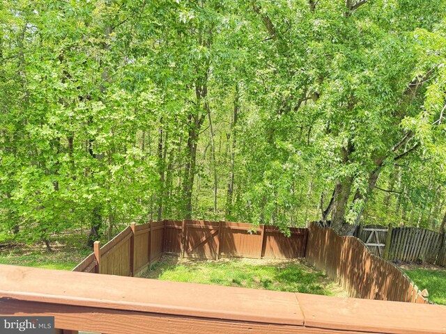 exterior space with a fenced backyard