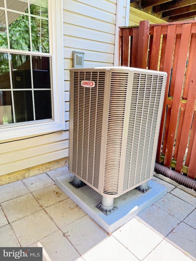 exterior details featuring central AC