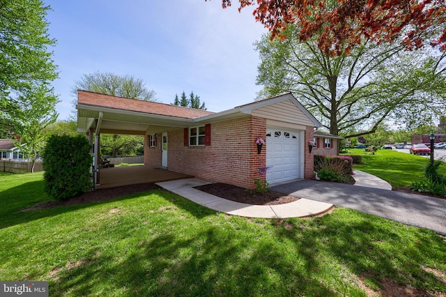 view of front of home with brick siding, a garage, driveway, and a front yard