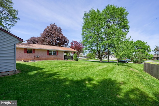 view of yard with fence