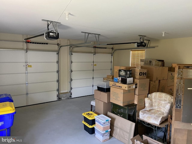 garage featuring a garage door opener