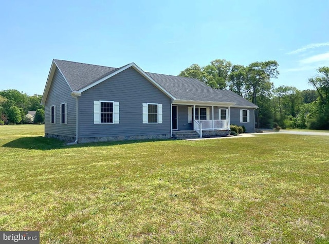 ranch-style home with covered porch, crawl space, and a front yard