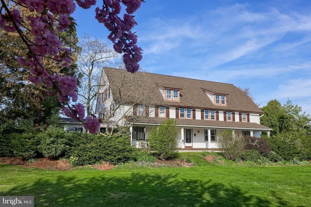 104 N Custer Ave, New Holland, PA 17557 - view of front of house featuring a front lawn and covered porch