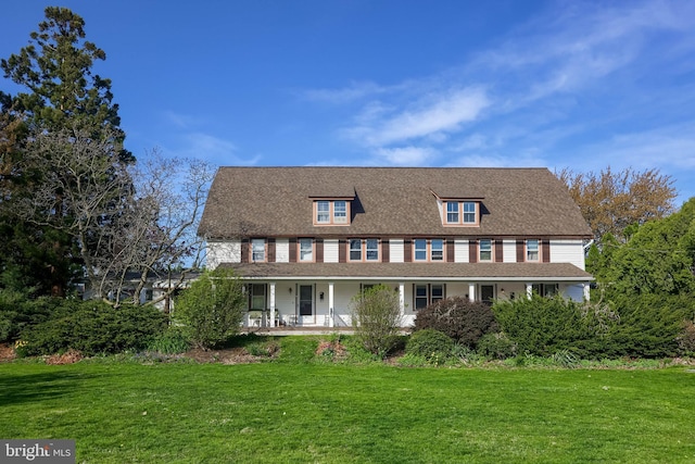 104 N Custer Ave, New Holland, PA 17557 - view of front of house with a porch and a front lawn