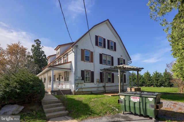 104 N Custer Ave, New Holland, PA 17557 - view of front of property with a pergola, a porch, and a front lawn
