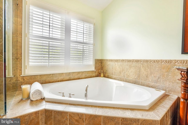 bathroom featuring a bath