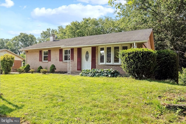 2007 Evansdale Dr, Hyattsville, MD 20783 - ranch-style house with a front yard, brick siding, and a chimney