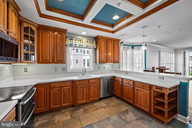 kitchen featuring brown cabinetry, a sink, a peninsula, ornamental molding, and stainless steel appliances