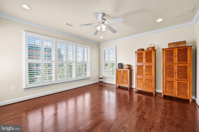 interior space with visible vents, wood finished floors, baseboards, ornamental molding, and recessed lighting