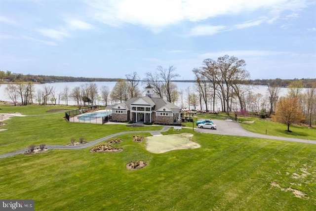 drone / aerial view featuring a water view