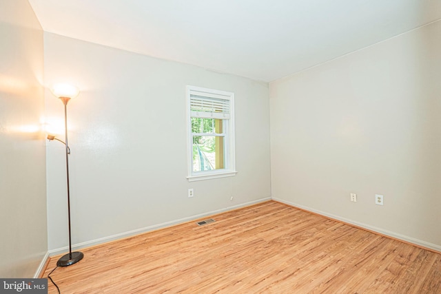 11039 Timberview Dr, Manassas, VA 20111 - spare room featuring wood finished floors and baseboards