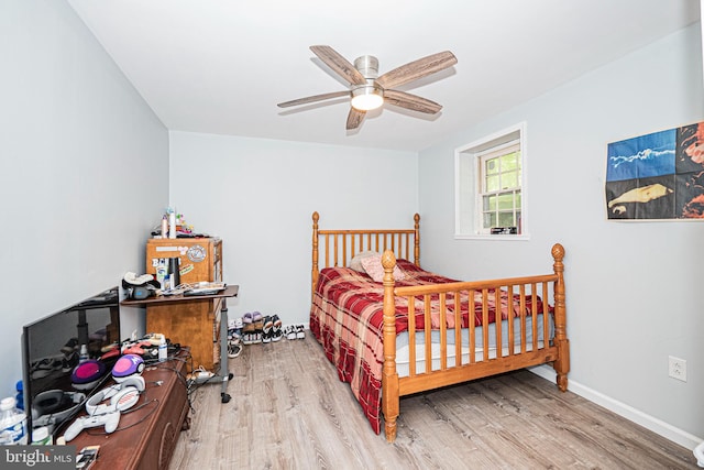 11039 Timberview Dr, Manassas, VA 20111 - bedroom with wood finished floors, a ceiling fan, and baseboards