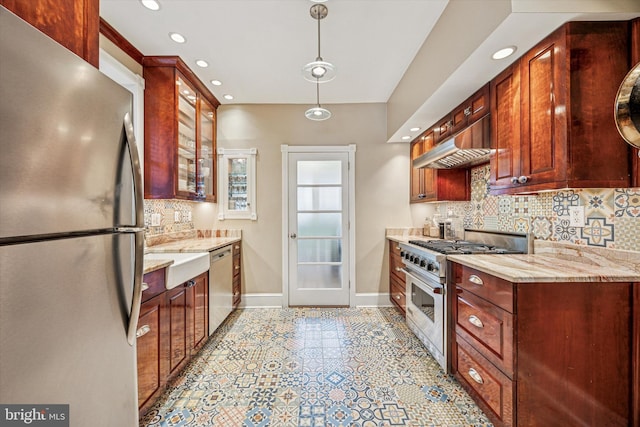 2410 S Camac St, Philadelphia, PA 19148 - kitchen featuring decorative light fixtures, appliances with stainless steel finishes, tasteful backsplash, baseboards, and under cabinet range hood