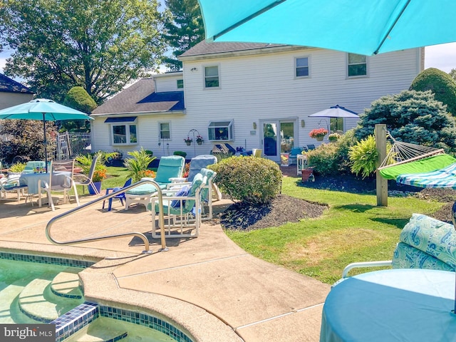 view of swimming pool with a patio