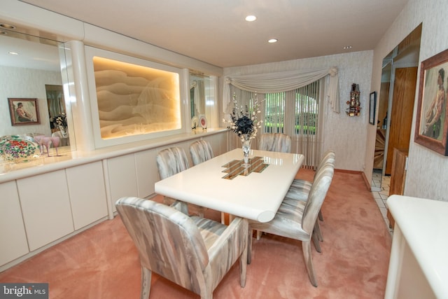 dining area featuring wallpapered walls, light carpet, and recessed lighting