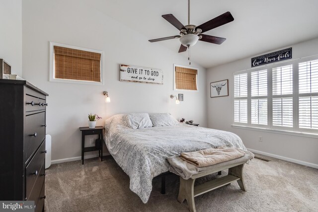 bedroom with baseboards, carpet, vaulted ceiling, and visible vents