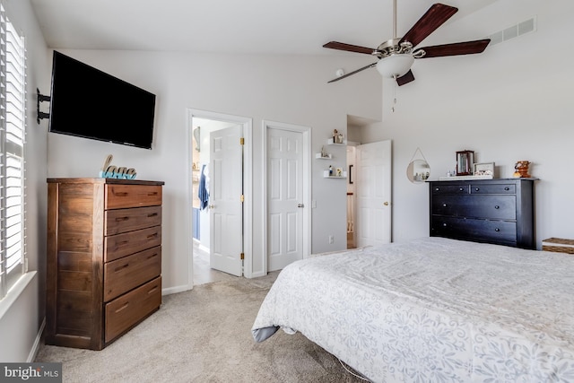 bedroom featuring a ceiling fan, baseboards, visible vents, and light carpet