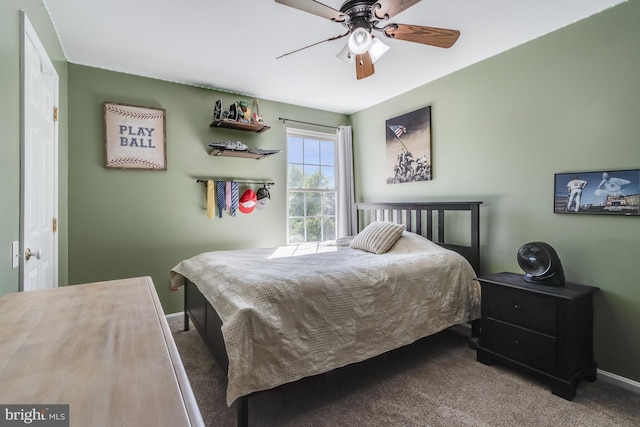 bedroom with baseboards, carpet, and ceiling fan