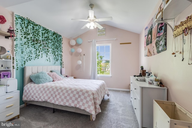 carpeted bedroom with baseboards, ceiling fan, and vaulted ceiling