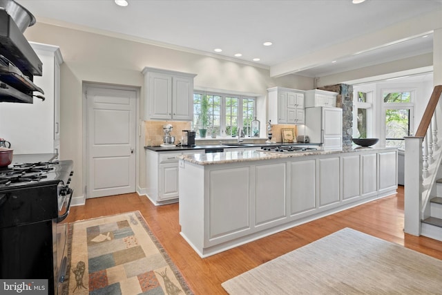 805 Evans Rd, Gwynedd Valley, PA 19437 - kitchen featuring a sink, range with gas cooktop, range hood, healthy amount of natural light, and recessed lighting