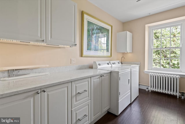 805 Evans Rd, Gwynedd Valley, PA 19437 - laundry room featuring radiator heating unit, washer and clothes dryer, cabinet space, and dark wood-style floors