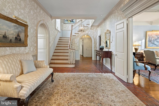 805 Evans Rd, Gwynedd Valley, PA 19437 - foyer featuring wallpapered walls, stairs, arched walkways, and ornamental molding