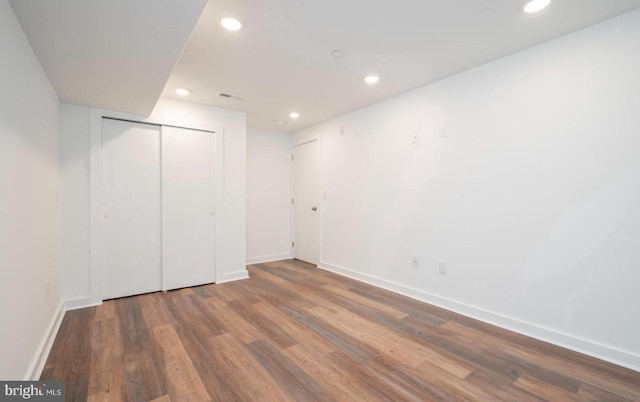 727 N 39th St, Philadelphia, PA 19104 - unfurnished bedroom with baseboards, a closet, recessed lighting, and wood finished floors