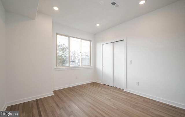 727 N 39th St, Philadelphia, PA 19104 - unfurnished bedroom featuring visible vents, baseboards, a closet, light wood finished floors, and recessed lighting