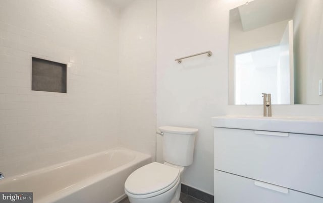 727 N 39th St, Philadelphia, PA 19104 - bathroom featuring vanity, baseboards, toilet, and tub / shower combination