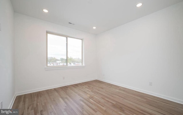 727 N 39th St, Philadelphia, PA 19104 - spare room featuring baseboards, recessed lighting, wood finished floors, and visible vents