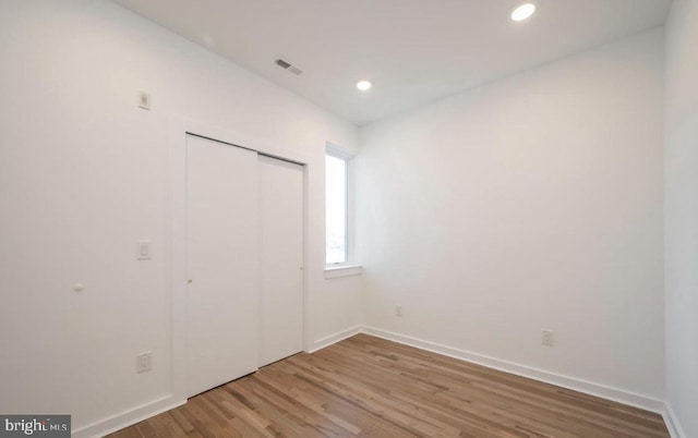 727 N 39th St, Philadelphia, PA 19104 - unfurnished bedroom featuring recessed lighting, baseboards, wood finished floors, visible vents, and a closet