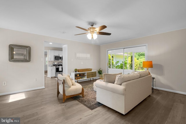 1725 Stratton Rd, Crofton, MD 21114 - living area with baseboards, light wood-type flooring, and ceiling fan