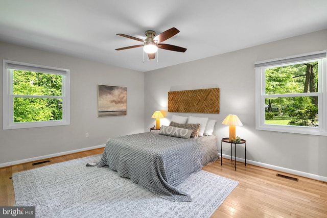1725 Stratton Rd, Crofton, MD 21114 - bedroom with baseboards, wood finished floors, and a ceiling fan
