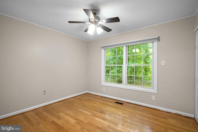 1725 Stratton Rd, Crofton, MD 21114 - empty room featuring baseboards, crown molding, light wood-style floors, and ceiling fan