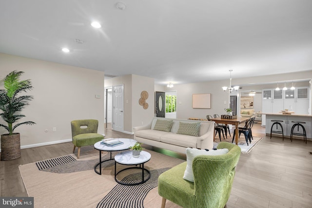 1725 Stratton Rd, Crofton, MD 21114 - living area featuring a chandelier, light wood finished floors, baseboards, and recessed lighting