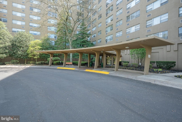 1030 E Lancaster Ave Unit 330, Bryn Mawr, PA 19010 - view of vehicle parking featuring fence