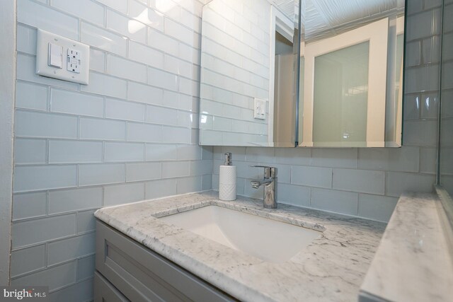 1030 E Lancaster Ave Unit 330, Bryn Mawr, PA 19010 - bathroom featuring vanity and tasteful backsplash