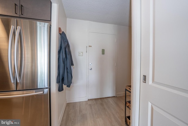 1030 E Lancaster Ave Unit 330, Bryn Mawr, PA 19010 - interior space with light wood finished floors, a textured ceiling, and baseboards