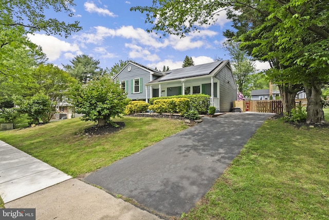 13405 Wisteria Dr, Germantown, MD 20874 - view of front of property with solar panels and driveway