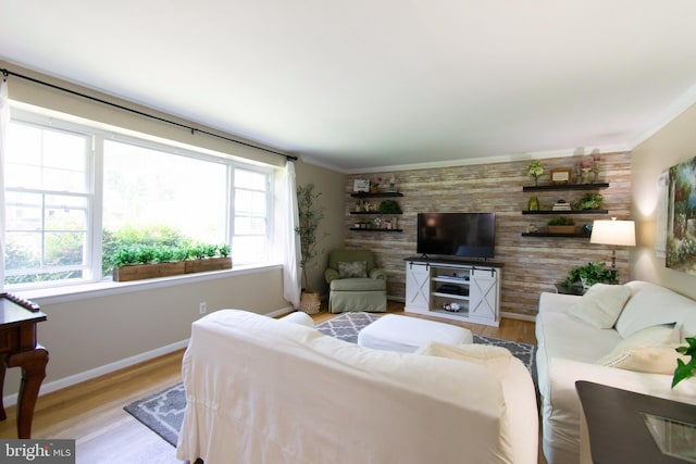 5 Gailridge Ct, Lutherville Timonium, MD 21093 - living room featuring plenty of natural light, light wood-style floors, an accent wall, and crown molding
