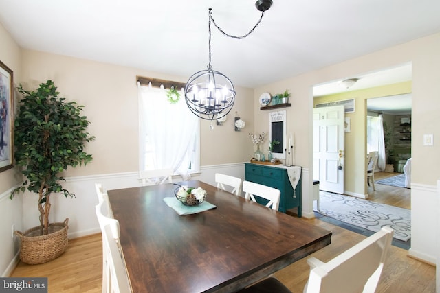 5 Gailridge Ct, Lutherville Timonium, MD 21093 - dining space with light wood finished floors, a chandelier, and baseboards